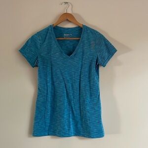 Blue Reebok Tee with Smaller Striped Pattern Size S